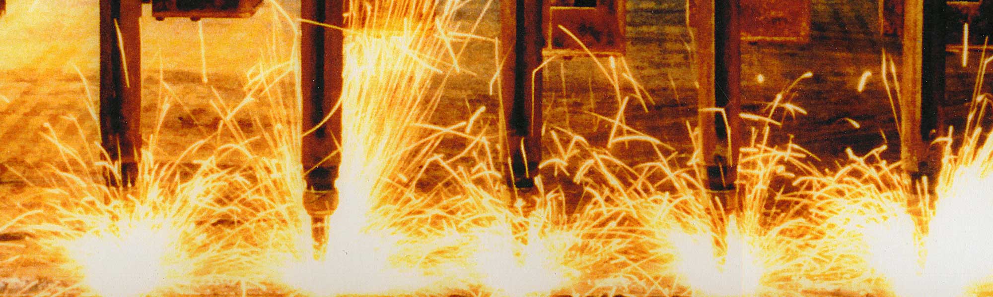 sparks flying at a steel fabrication shop