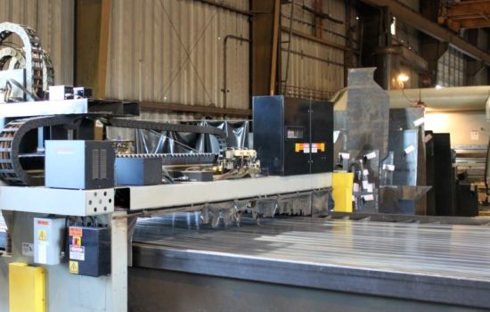 steel fabrication warehouse with robot cutting with a waterjet