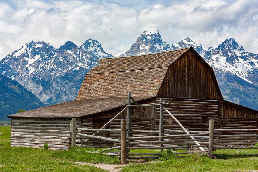 Barn in front of Wyoming mountain range